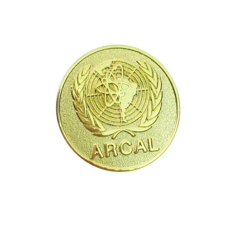 Gold pin badge (1)