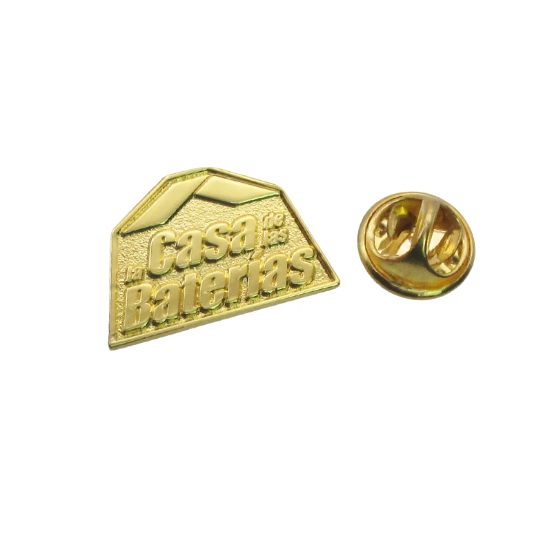 Gold pin badge